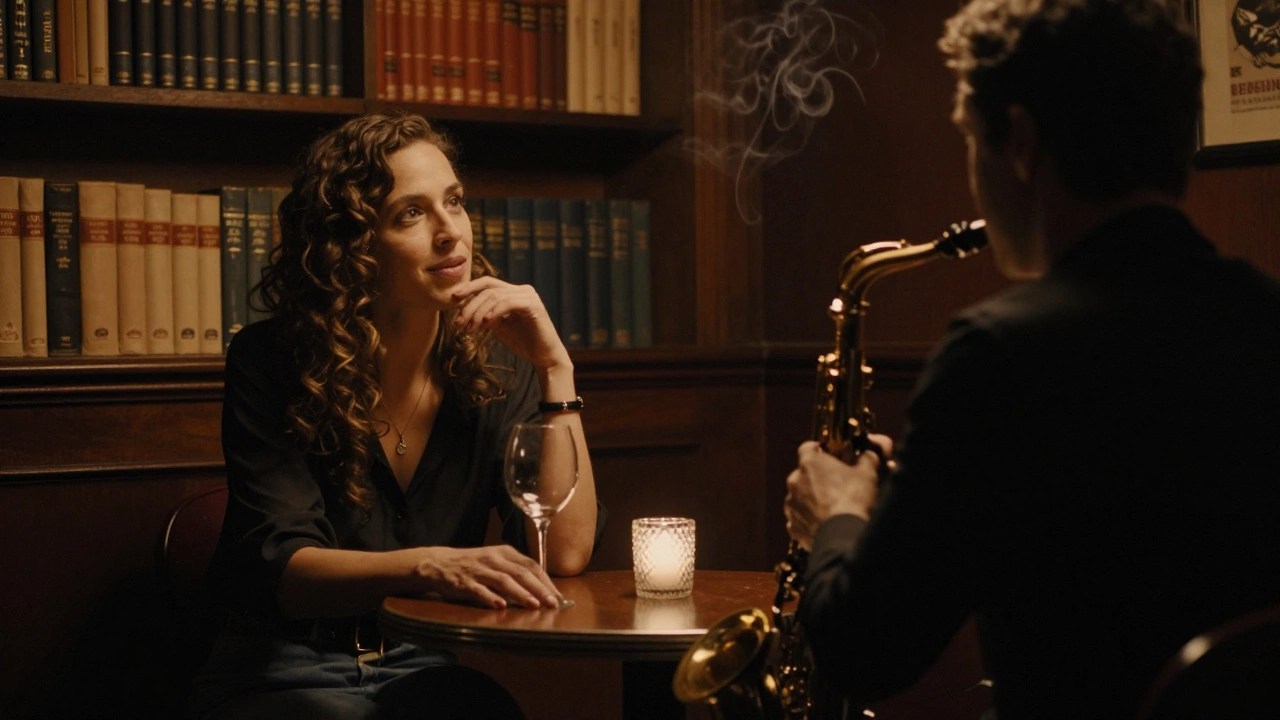 A woman listens intently in a dim jazz club, wine glass beside her, books visible in the background.
