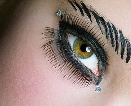 Exotic black makeup style with long lashes